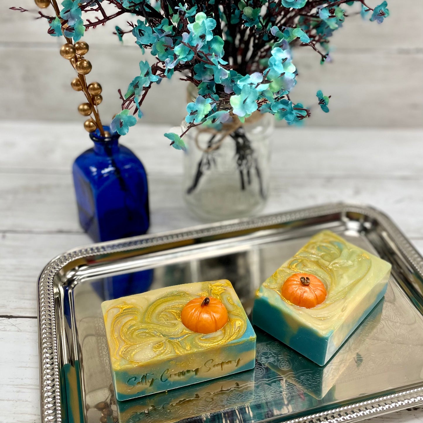 pumpkin soaps on silver platter