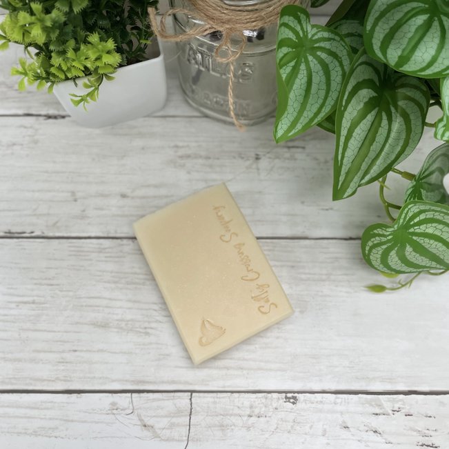 white bath bar stamped with sailboat and Salty Crossing Soapery