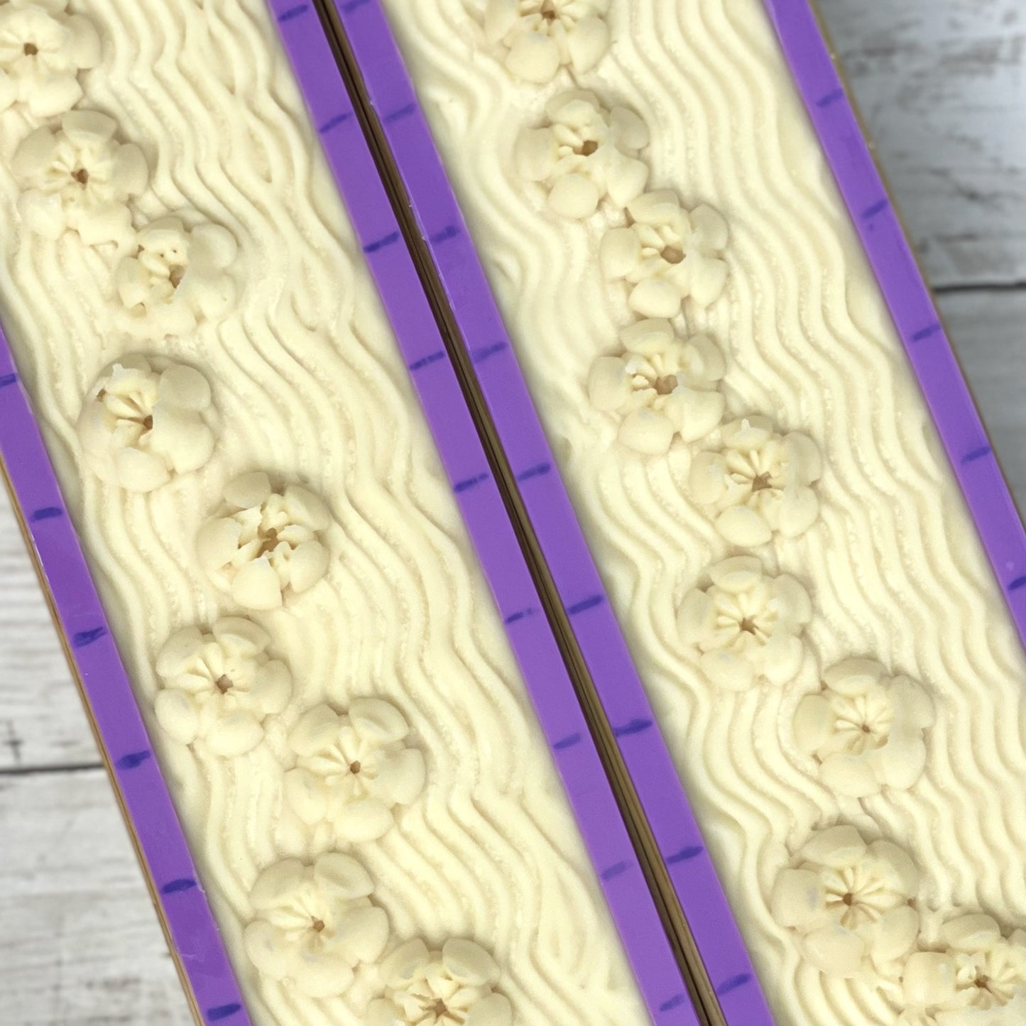 fancy flower coconut milk soap loaves in mold