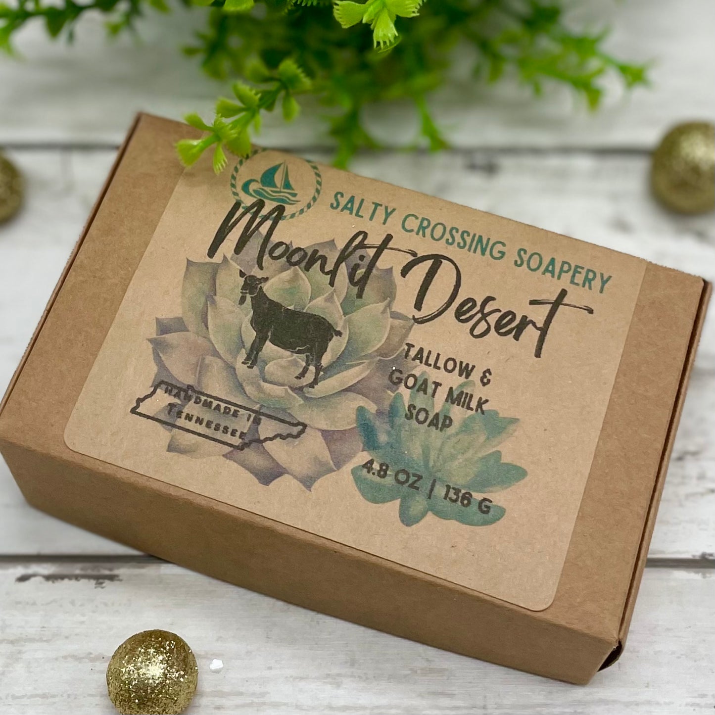 Moonlit Desert soap packaging with succulent design on a wooden surface