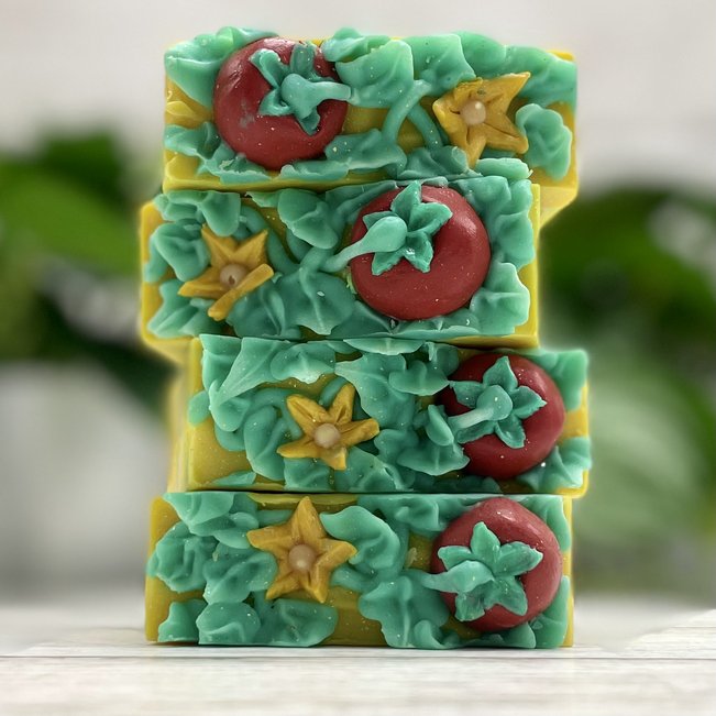 maters on the vine fancy bath bars. stack of bars with close up of hand sculpted soap tomatoes, vines, and flower blossomes
