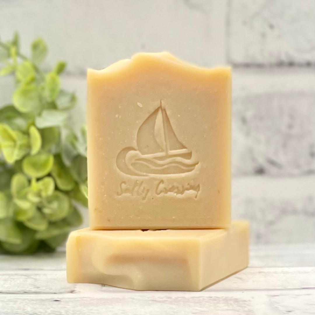 goat milk soap bars stamped with sailboat and Salty Crossing brand