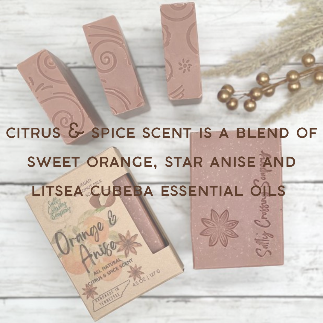 Orange and anise soap bars with text. Citrus and spice scent is a blend of sweet orange, star anise, and litsea cubeba essential oils