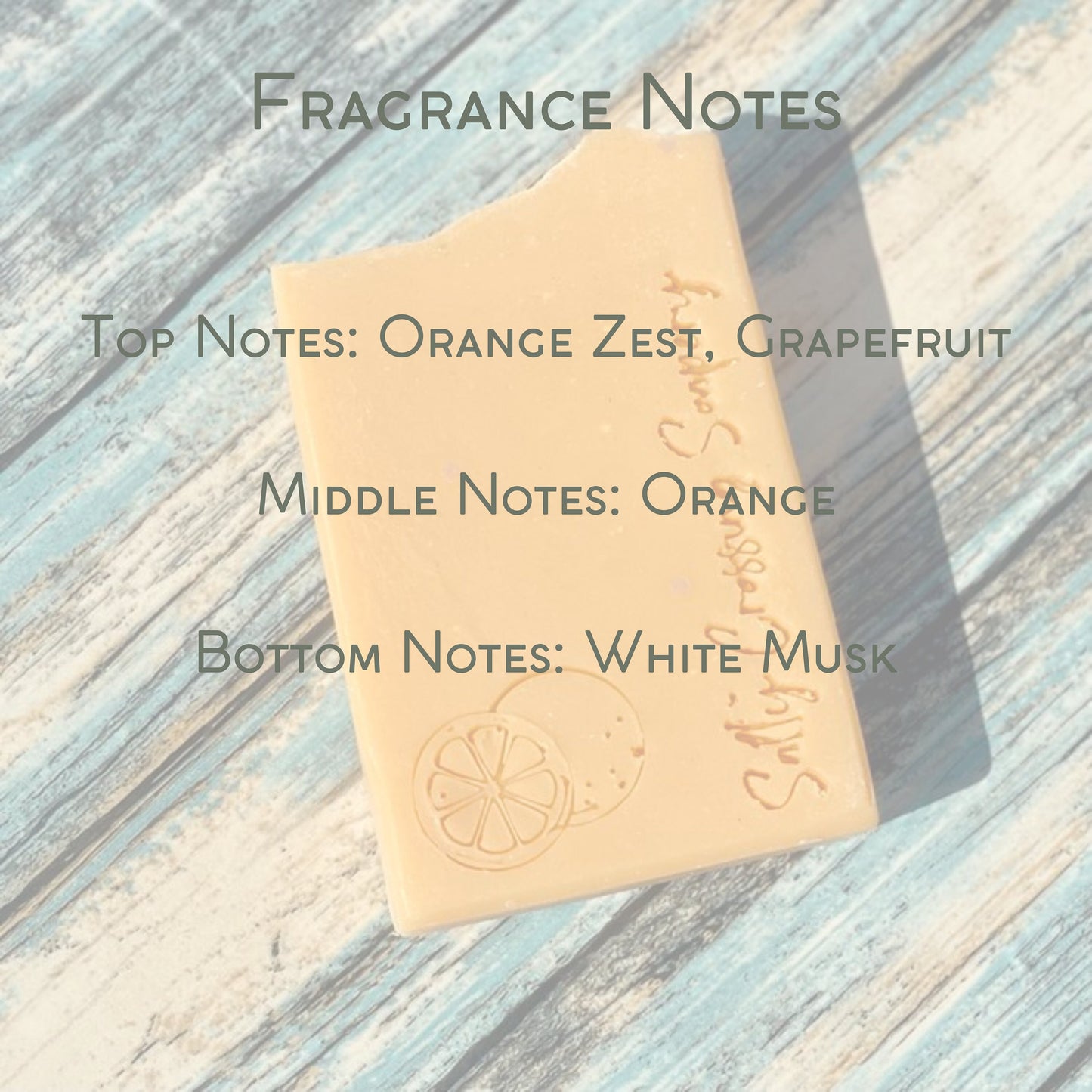 fragrance notes graphic. top notes orange zest and grapefruit. middle notes orange. bottom notes white musk.