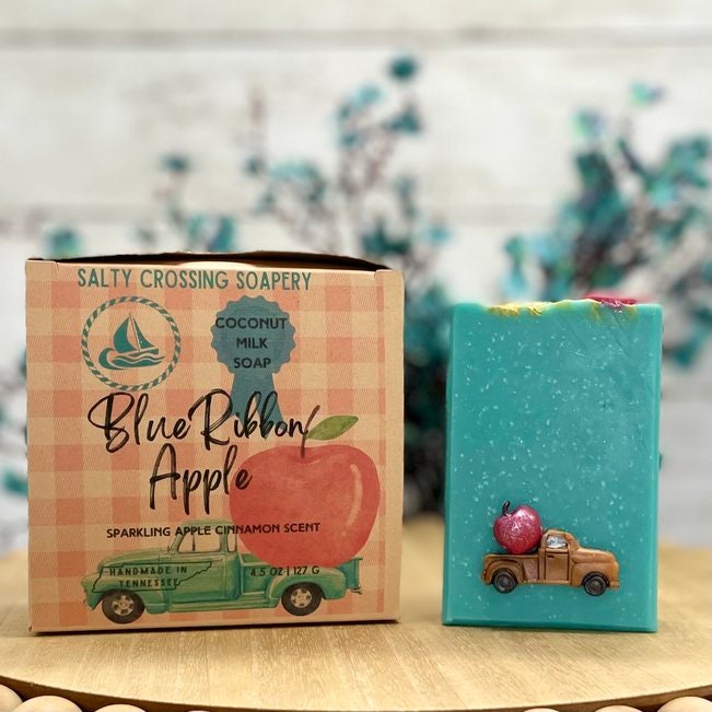 blue ribbon apple soap with box. box has graphic truck with apple design. handmade in tennessee.