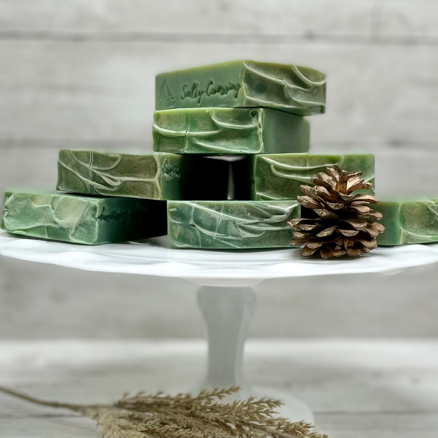 Green soaps displayed on cake stand
