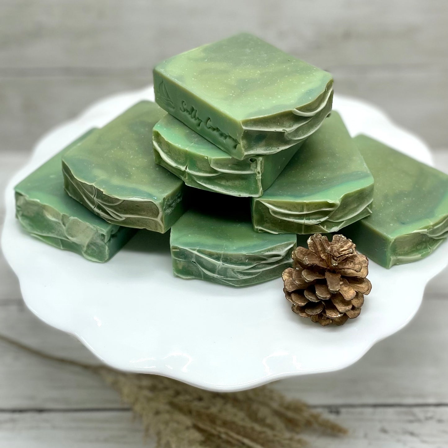 Green soaps displayed on cake stand